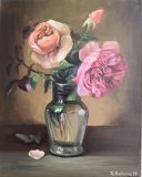 Painted pink roses in a glass vase