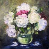 Peonies in a glass vase